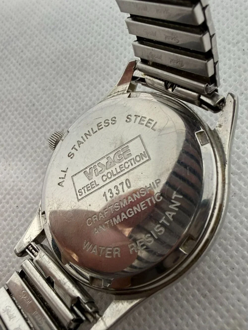 Visage Quartz Wristwatch Silver Dial Textured Center Roman Numerals 13370